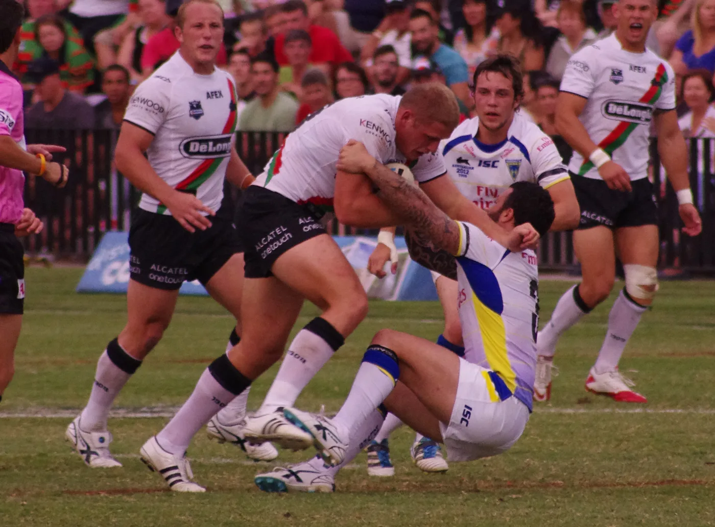 Warrington players in action against South Sydney Rabbitohs